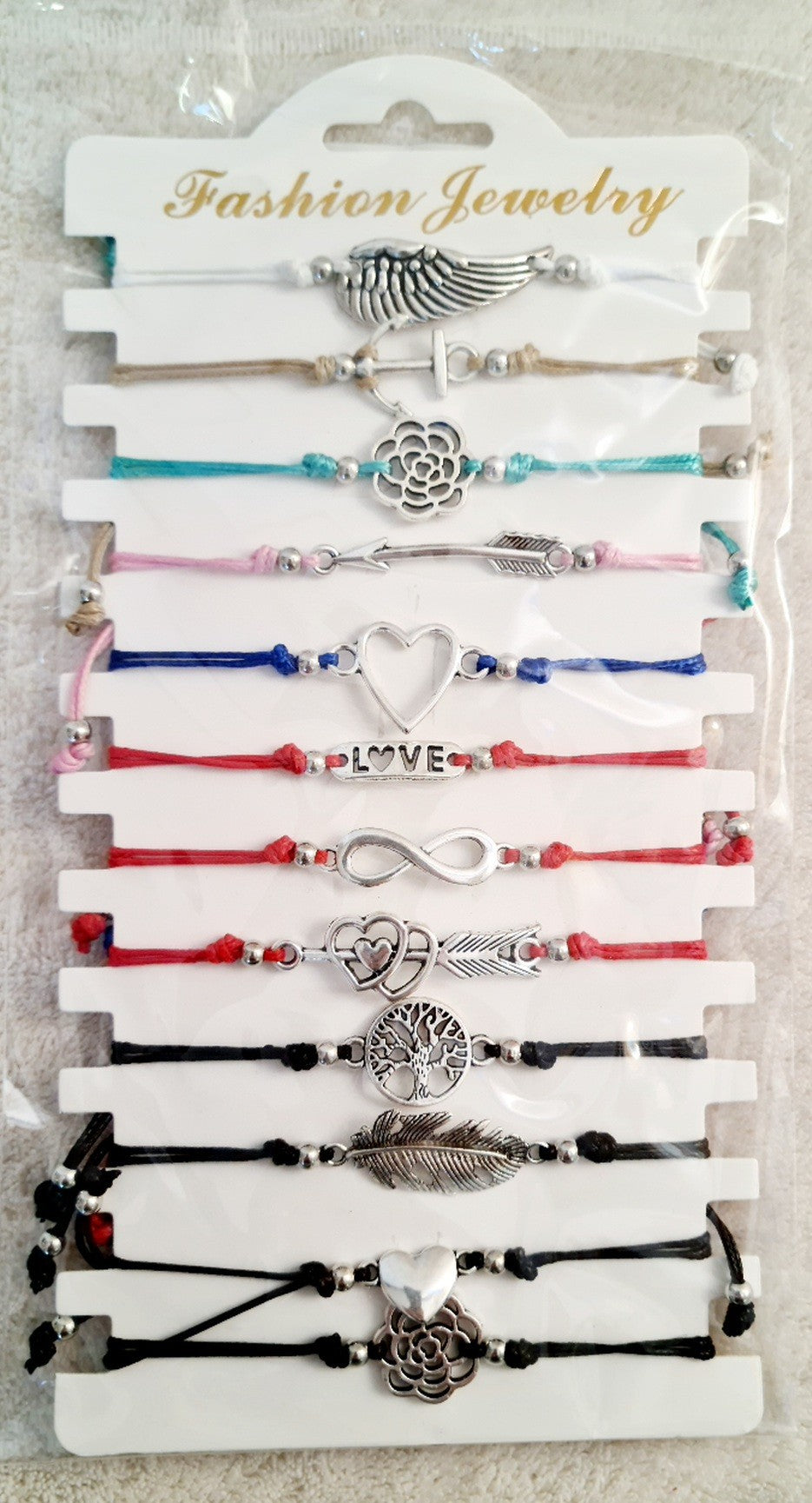 BRACELET SYMBOLE X12PCS (MH61477)